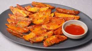 Potato Wedges tossed with Sweet Chilly
