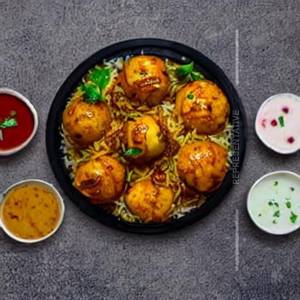 Sizzler Dum Aloo Makai Biryani Sizzler