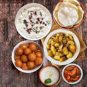 Curd Rice + Curd Rice + Aloo Jeera + 2 Gulab Jamun + 2 Buttermilk