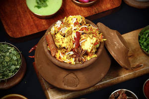 Matki Paneer Tikka Biryani With Gravy Or Raita (serves 1-2)