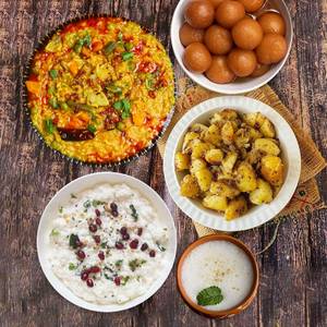 Masala Khichdi + Curd Rice + Aloo Jeera + 2 Gulab Jamun + 2 Buttermilk