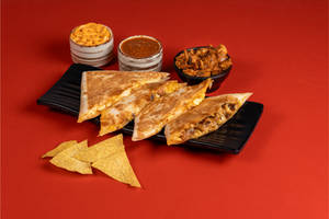Cheesy Spicy Rojo Chicken Quesadilla