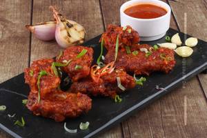 Chicken Wings  in Hot Garlic Sauce gravy
