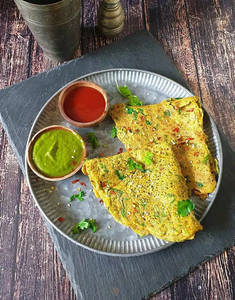 Moong Dal Chilla With Curd