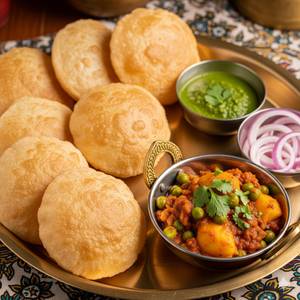 4 Butter Tawa Roti + Aloo Tamatar Sabji + Achar + Salad + 1 Mouth freshner