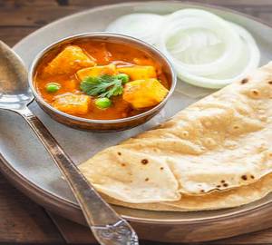 Aloo tamatar ki rasili sabji with roti [2 pieces]