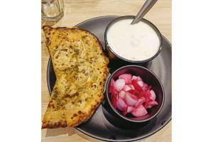 Veg Stuffed Naan With Curd