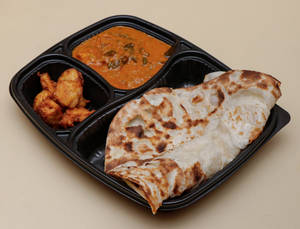2 Naan, Hyderabadi Boneless Chicken Gravy & Popcorn Kebab