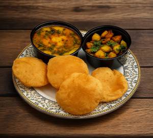 Dal ,Aloo Puri