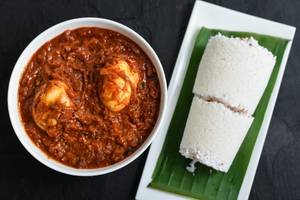 Puttu with egg curry