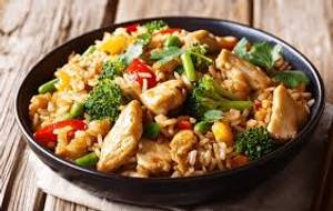 Brown Rice, Chicken Tikka With Sauteed Veggies In European Gravy