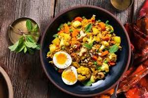 Brown Rice, Eggs With Sauteed Veggies In Indian Gravy