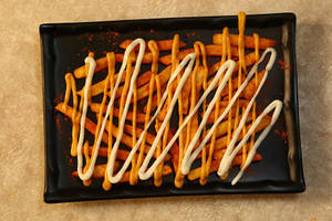 Peri Peri Cheesy Loaded Fries.