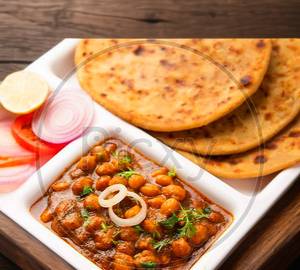 Punjabi chole with 2 tandoori aloo prantha