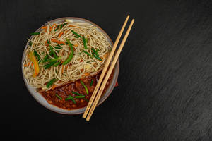 Noodles With Schezwan Chicken Gravy