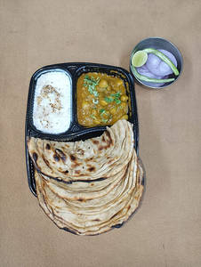 Chana Masala + Choice Of Bread + Masala Dahi + Salad