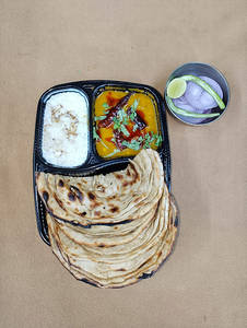 Dal Tadka + Choice Of Bread +  Masala Dahi + Salad