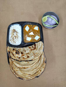 Paneer Butter Masala + Choice Of Bread + Masala Dahi + Salad