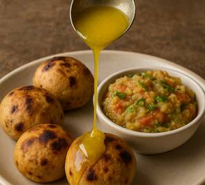 2 Pcs Ghee Dipped  Litti Chokha