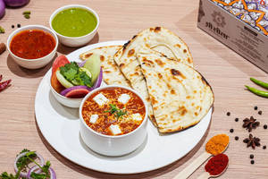 Butter Paneer Masala With Choice Of Bread.