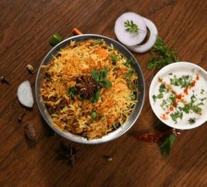 Veg biryani, rayta salad, green chatni