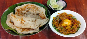Kerala Parotta With Egg Roast And Salad Combo