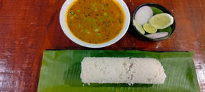 Puttu With Green Piece Curry  And Salad Combo