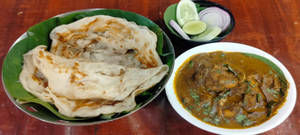 Kerala Parotta With Chicken Curry And Salad Combo