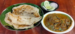 Kerala Porotta  With Chicken Curry And Salad Combo
