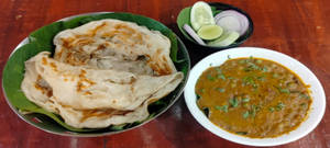 Kerala Parotta With Green Piece Curry And Salad Combo