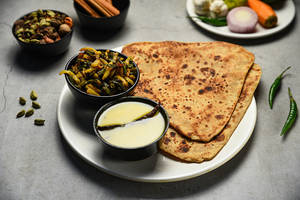 Aloo Bhujia (seasonal) + Yellow Dal (200ml) + Parath (2pcs)