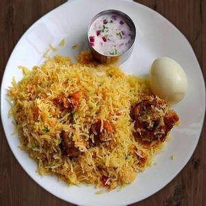 Special shahi chicken dum biryani with egg and extra piece
