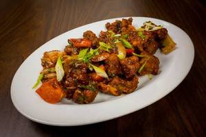 Veg Manchurian Momos [7 Pieces]