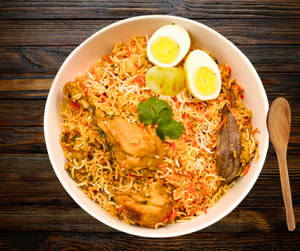 Kolkata Chicken Dum Biryani (complimentary Raita)