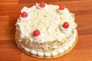 Eggless white forest exotic cake
