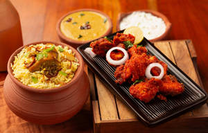 Thalassery Chicken Biryani With Kozhi Poruchathu