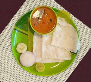 Neer dosa with coastal chicken curry