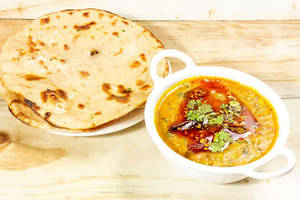 Dal Tadka With 2 Tawa Roti