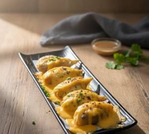 Melted Cheese Topped Fried Chicken Momo