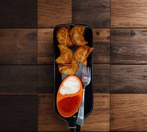 Chicken  fried momos 5  pieces with chicken  steamed momos 5  pieces