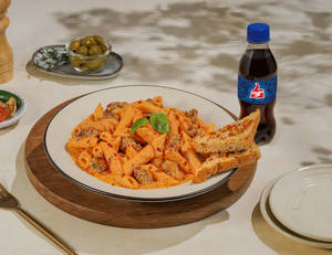 Herb Rub Chicken Mixed Pink Pasta + Thums Up