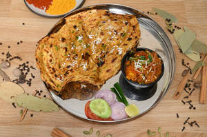 Chur Chur Naan Served With Kadhai Paneer