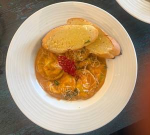Three Cheese Ravioli In A Tomato Basil Cream Sauce
