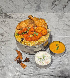 Spcl Biryani{1egg,6pc Of Chicken 65 & 2dum Peices}