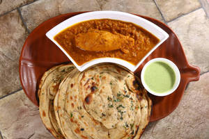 Chicken Curry + Paratha (2 Pcs)