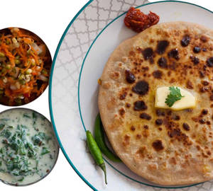2tawa Aloo Paratha +boondi Raita +pickle +mint Chutney +onion