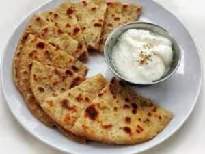 Aloo paratha with curd