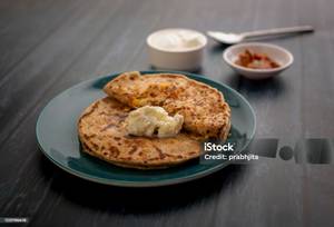 Satu paratha (2 pieces )+kheer + seaosnal sabji + salad