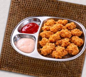 Crispy chicken popcorn 18 pcs .
