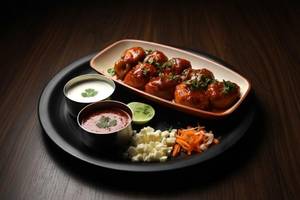 Paneer Chilly Gravy Momos